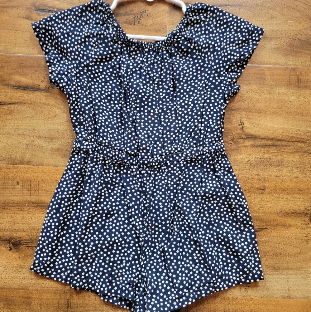 Navy blue with small white polka-dot romper